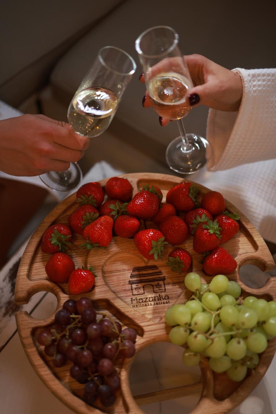 Celebration board with prosecco and fresh fruit