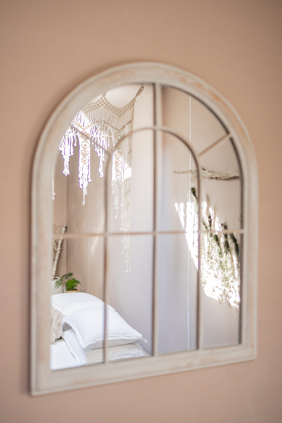 Bedroom with an arched window