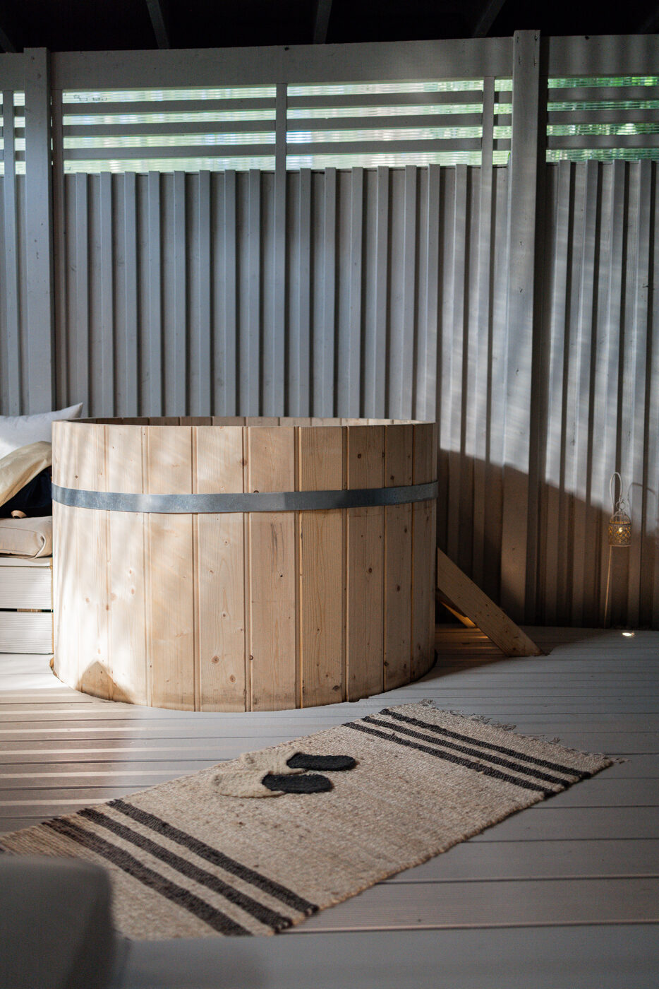 Wooden cold plunge on the deck
